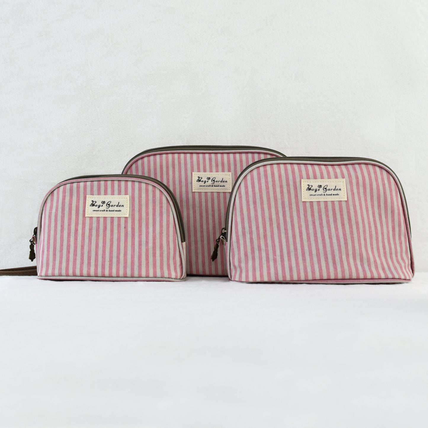 Neceser impermeable de rayas de 3 piezas con asa de mano