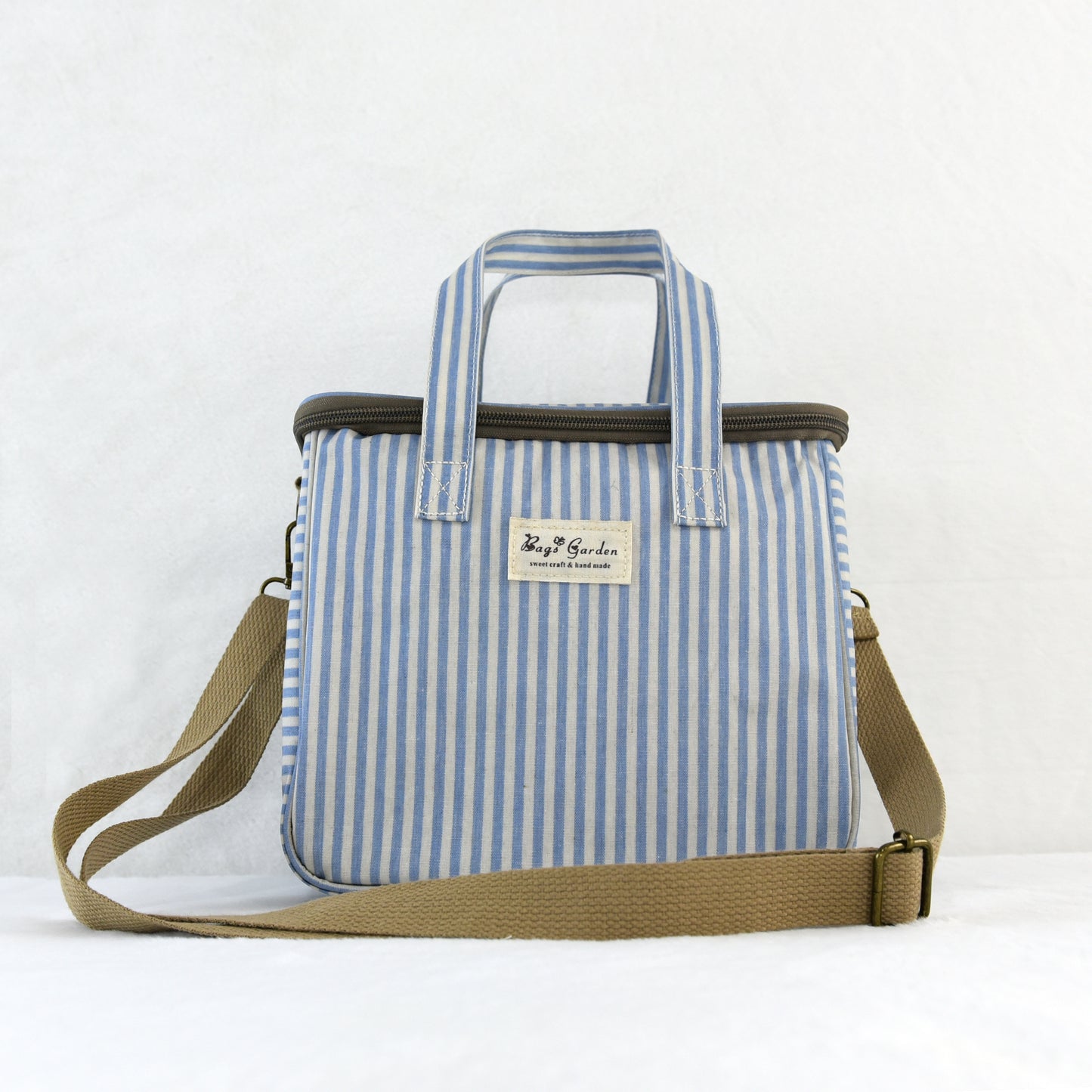 Bolsa nevera impermeable a rayas con asa y correa ajustable