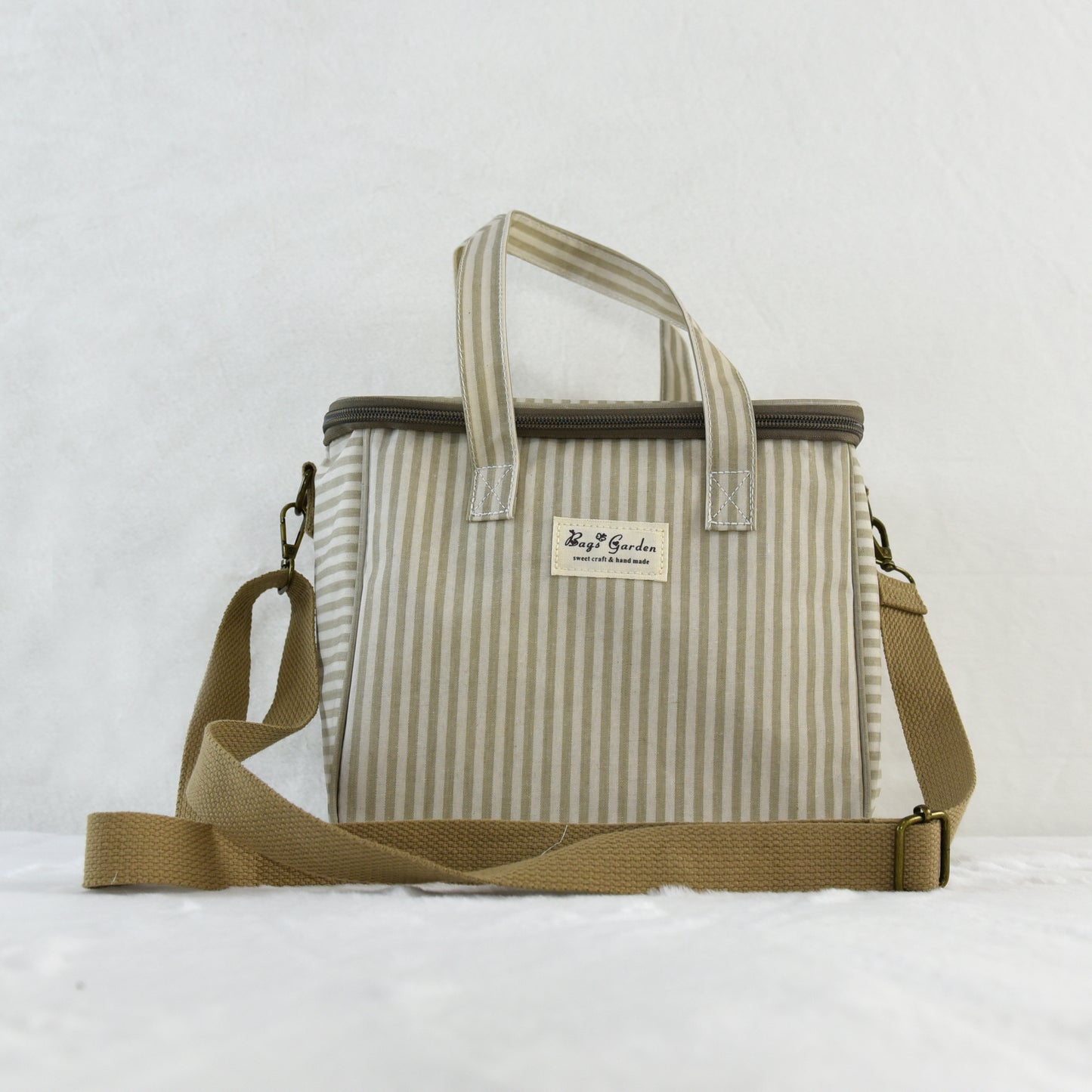 Bolsa nevera impermeable a rayas con asa y correa ajustable