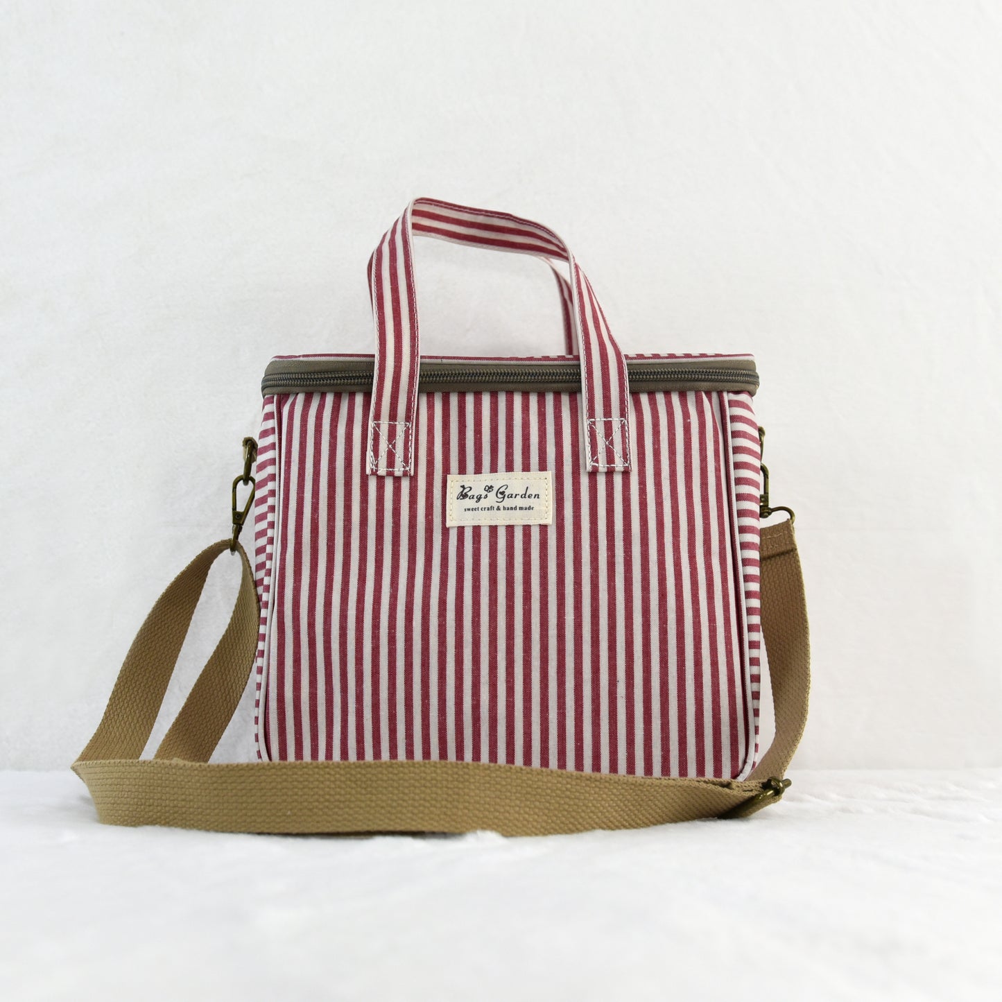Bolsa nevera impermeable a rayas con asa y correa ajustable