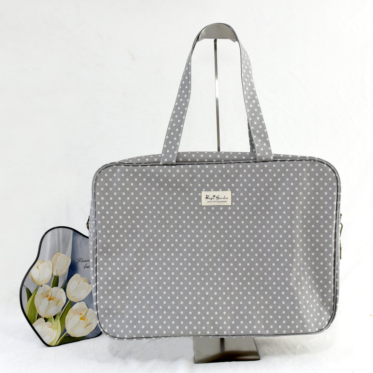 Maletita impermeable de lunares grande