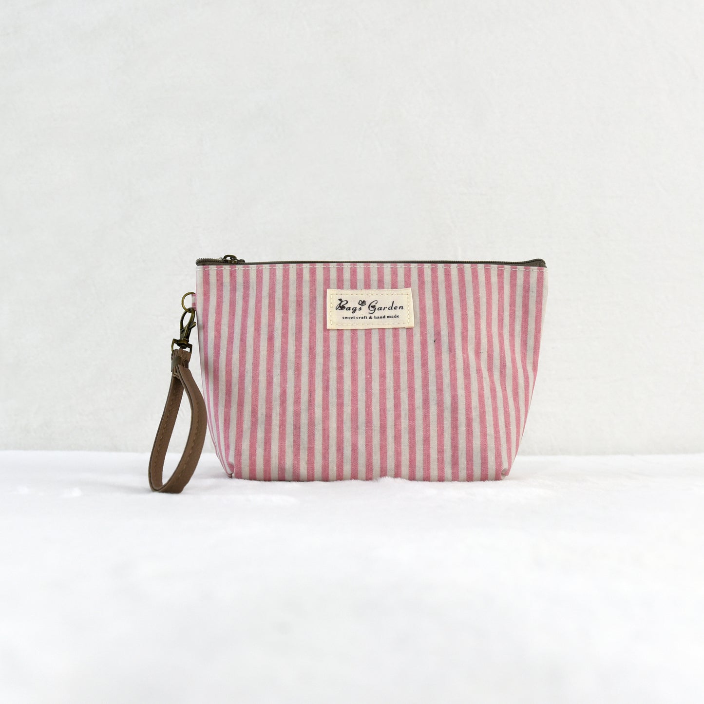Neceser pequeño impermeable a rayas con cremallera, práctico para maquillaje y accesorios
